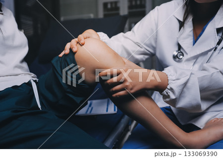 Rehabilitation therapy Professional male physiotherapists working in rehabilitation centers while treating male patients with leg and muscle pain. 133069390