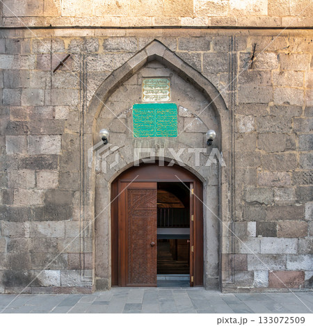Historic Kayseri Grand Mosque Ulu Camii entrance with ornate wooden door and stone arch in Kayseri, Turkey 133072509