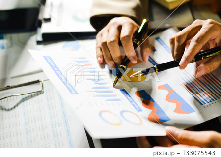 business people in meeting discussing plans together business people in meeting discussing plans together 133075543