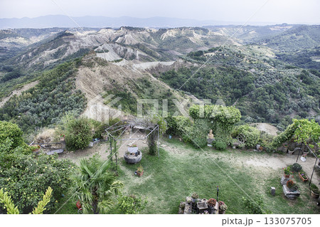 Panoramic View of Calanchi Badlands near Civita di Bagnoregio, Italy Panoramic View of Calanchi Badlands near Civita di Bagnoregio, Italy 133075705