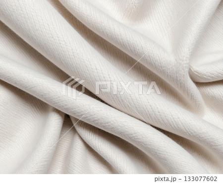 Lighting. Crisp details. Natural light color. Texture of premium white textile fabric. Premium cashmere material. 133077602