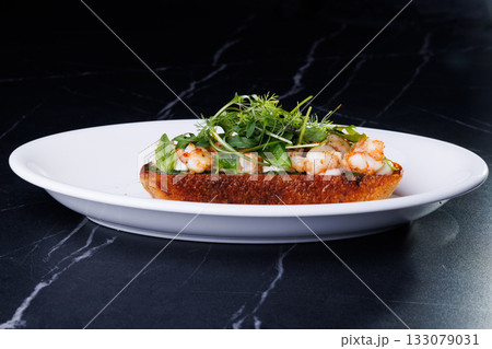 Delicious shrimp toast on rye bread: a healthy breakfast 133079031