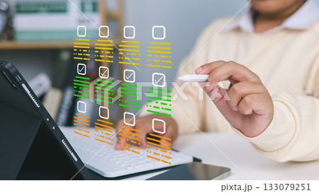 Digital Checklist and Task Management Interface on Tablet with Stylus Digital Checklist and Task Management Interface on Tablet with Stylus 133079251