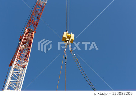 Heavy crane hook with sky background. 133082209