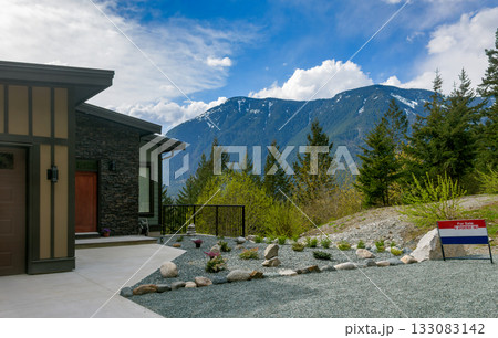 Entrance of residential house on snow mountain and cloudy blue sky background Entrance of residential house on snow mountain and cloudy blue sky background 133083142