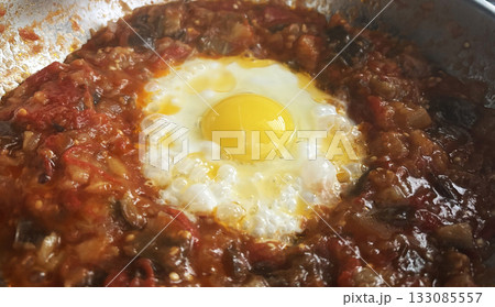 Shakshouka tunisian egg breakfast close up Shakshouka tunisian egg breakfast close up 133085557