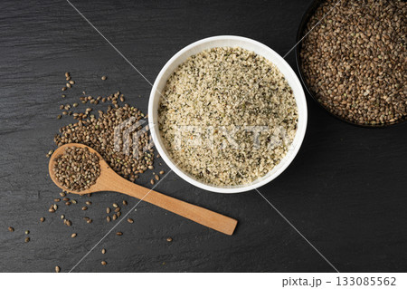 Shelled hemp seeds pile, peeled cannabis grains, marijuana kernels without peel 133085562