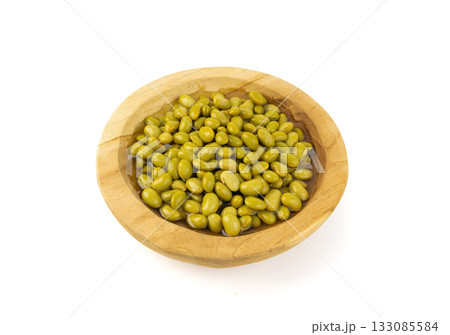 Edamame beans isolated. Green soy bean pile, cooked young soybean, boiled Japanese pea Edamame beans isolated. Green soy bean pile, cooked young soybean, boiled Japanese pea 133085584