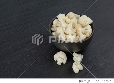 Steamed cauliflower pieces close up Steamed cauliflower pieces close up 133085607