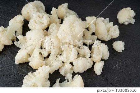 Steamed cauliflower pieces close up Steamed cauliflower pieces close up 133085610