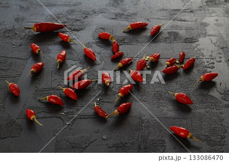 red hot chili peppers on black background 133086470