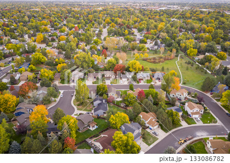 dawn over residential streets of Fort Collins in northern Colorado, early fall sunrise aerial scenery dawn over residential streets of Fort Collins in northern Colorado, early fall sunrise aerial scenery 133086782
