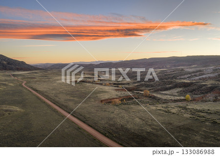 dusk over a valley in foothills of Rocky Mountains in Colorado in fall scenery 133086988