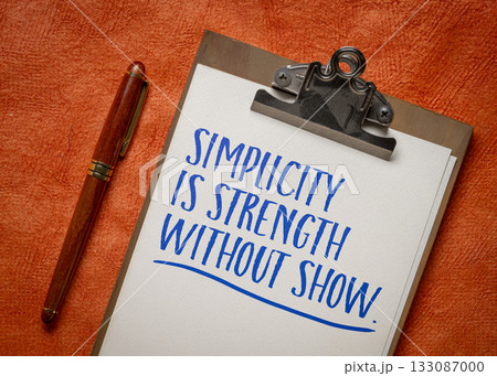 simplicity is strength without show - inspirational note on a clipboard simplicity is strength without show - inspirational note on a clipboard 133087000