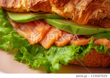 Croissant with salmon and avocado 133087029