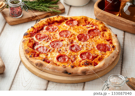 Pepperoni pizza with melted cheese 133087040