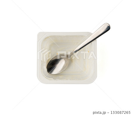 Empty yogurt cup isolated, yoghurt with orange fruits pieces in plastic pot, milk pudding container 133087265