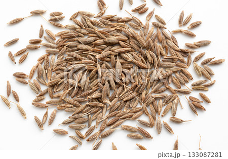 Cumin seed isolated. Caraway or fennel dry seeds close up, zeera macro, Indian cumin or zira grains Cumin seed isolated. Caraway or fennel dry seeds close up, zeera macro, Indian cumin or zira grains 133087281