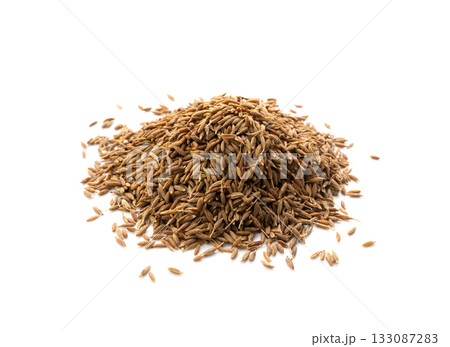 Cumin seed isolated. Caraway or fennel dry seeds close up, zeera macro, Indian cumin or zira grains Cumin seed isolated. Caraway or fennel dry seeds close up, zeera macro, Indian cumin or zira grains 133087283