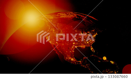 A detailed view of Earth from space, showcasing North America glowing intensely as the sun rises, highlighting the warmth and vibrant lights of urban areas during twilight. A detailed view of Earth from space, showcasing North America glowing intensely as the sun rises, highlighting the warmth and vibrant lights of urban areas during twilight. 133087660