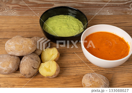 Red mojo rojo and green mojo verde sauces, traditional Tenerife dips, mojo picon dressing 133088027