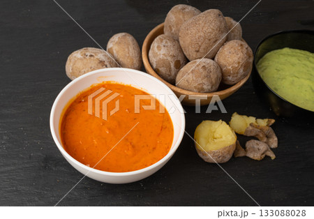 Red mojo rojo and green mojo verde sauces, traditional Tenerife dips, mojo picon dressing 133088028