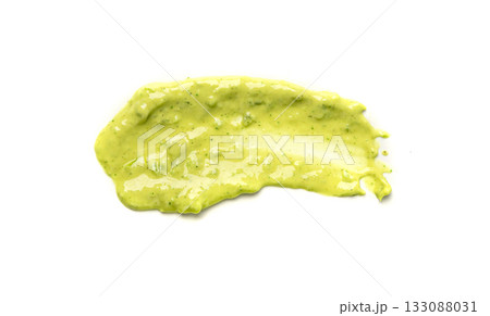 Green mojo verde sauce smear, dressing splatter drip, Canary Islands food Green mojo verde sauce smear, dressing splatter drip, Canary Islands food 133088031