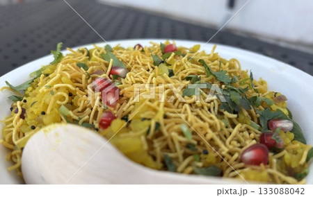 Poha Indian breakfast food. Healthy pohe rice flakes dish 133088042