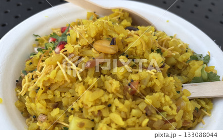 Poha Indian breakfast food. Healthy pohe rice flakes dish 133088044
