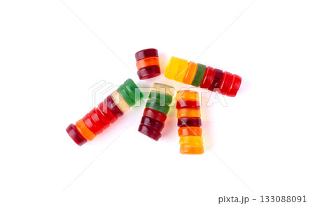 Round gummy candy pile isolated. Chewing colorful marmalade pills, jelly gumdrops heap 133088091