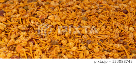 Navrattan namkeen mixture. Indian nimko snack, spicy and sweet farsaan Navrattan namkeen mixture. Indian nimko snack, spicy and sweet farsaan 133088745