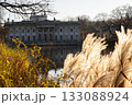 Palace on the Isle reflected in water, Lazienki Park Warsaw  autumn sunlight 133088924
