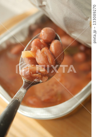 Beans in savory sauce served on a spoon Beans in savory sauce served on a spoon 133089270
