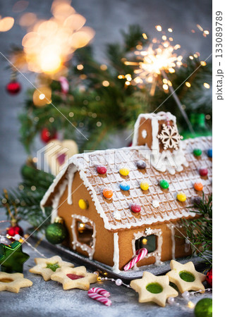 Homemade Christmas gingerbread house with holiday decorations 133089789