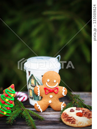 Gingerbread man and Shortbread Owl cookies for Christmas and cup of coffee 133089824