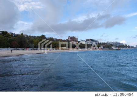 Beautiful seascape of the Black Sea. A seascape of the Black Sea with gentle waves lapping a sandy beach. Beautiful seascape of the Black Sea. A seascape of the Black Sea with gentle waves lapping a sandy beach. 133090484