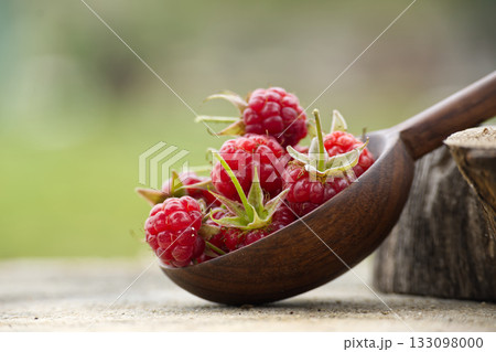 Fresh Raspberries In Wooden Scoop On Rustic Table Showcasing Natural Freshness And Summer Flavor Fresh Raspberries In Wooden Scoop On Rustic Table Showcasing Natural Freshness And Summer Flavor 133098000