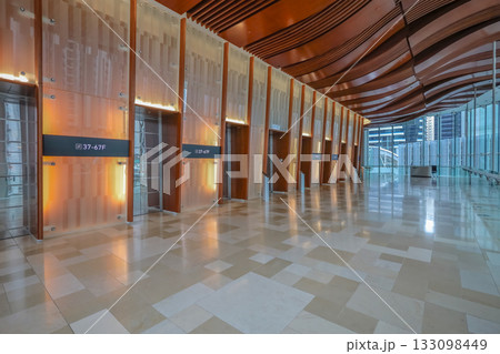 Oct 29 2025 Modern Atrium Corridor With Elevators, Curved Wooden Ceiling Oct 29 2025 Modern Atrium Corridor With Elevators, Curved Wooden Ceiling 133098449