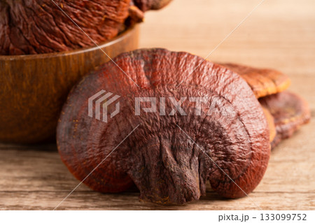 Lingzhi or Reishi mushroom with capsules, organic natural healthy food. 133099752