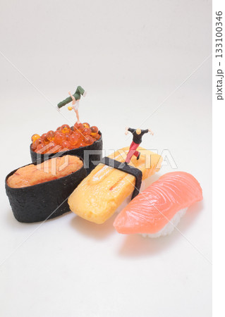 Playful Miniature Figures On Sushi Platter: Tuna, Salmon, Tamago Nigiri Playful Miniature Figures On Sushi Platter: Tuna, Salmon, Tamago Nigiri 133100346
