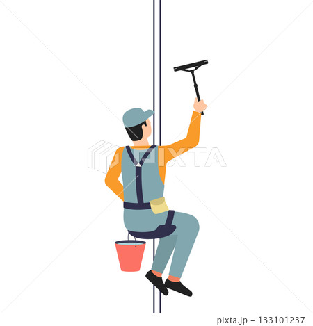 Male window cleaner in uniform hangs from a safety rope with a scraper in his hand Male window cleaner in uniform hangs from a safety rope with a scraper in his hand 133101237
