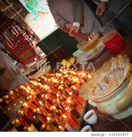 Pray in a Temple as Incense Sticks Burn, Creating a Colorful Ceremonial Scene,Chinese prayer, Chinese new year prayers 133101477