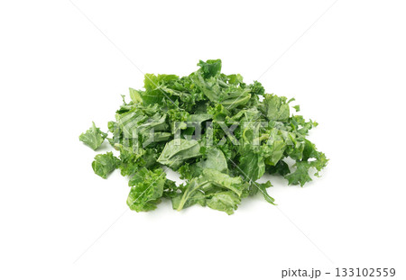 Pieces of kale cabbage leaves isolated. Green leaf of curly cabbage cooked for fresh salad Pieces of kale cabbage leaves isolated. Green leaf of curly cabbage cooked for fresh salad 133102559