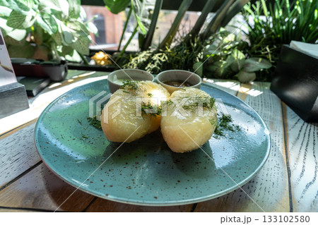 Lithuanian potato dumplings, cepelinai pancakes or kolduny, meat stuffed draniki, traditional didzkukuliai Lithuanian potato dumplings, cepelinai pancakes or kolduny, meat stuffed draniki, traditional didzkukuliai 133102580
