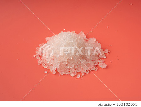 Dead sea salt pile, white crystals for body spa, sodium chloride similar to crushed ice, spa scrub 133102655