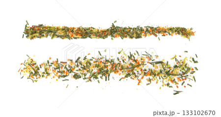 Dried vegetable mix isolated. Dehydrated greens, onion, carrot pieces, seasoning chips, flakes Dried vegetable mix isolated. Dehydrated greens, onion, carrot pieces, seasoning chips, flakes 133102670