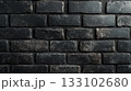 深みのある黒いレンガの背景用素材 133102680