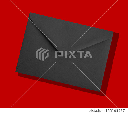 Black envelope with a letter inside. Premium stationery for mail, invitation, correspondence, or 133103927