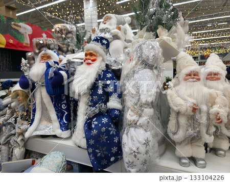 Festive Christmas Store Display with Santa Figurines Festive Christmas Store Display with Santa Figurines 133104226