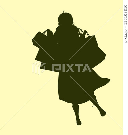 買い物袋をたくさん持った女性　ロングヘア　冬　シルエット 133108810